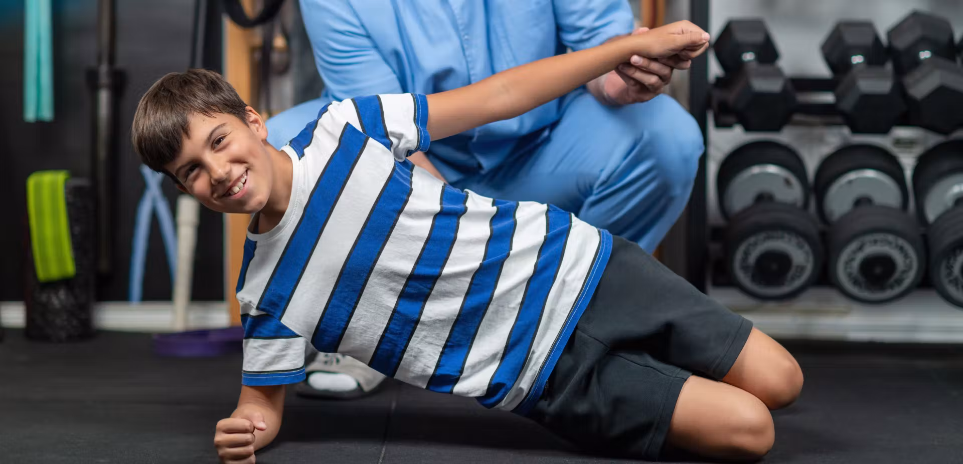 young boy in physical therapy working on core exer 2026 01 07 23 53 11 utc